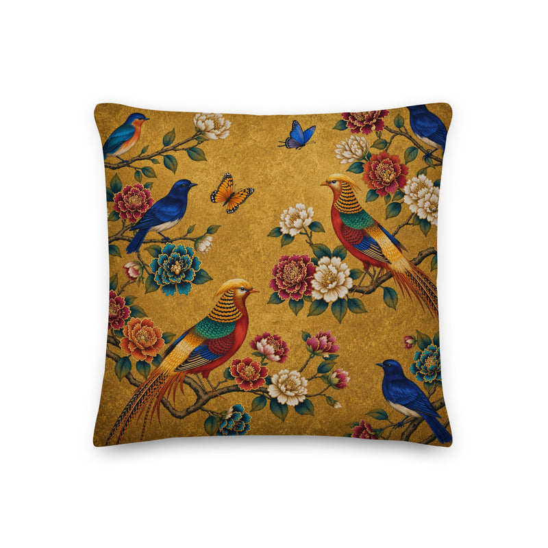 Decorative pillow with colorful birds and flowers on a gold background