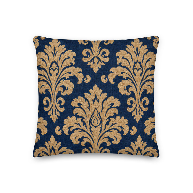 Decorative pillow with gold damask pattern on a blue background