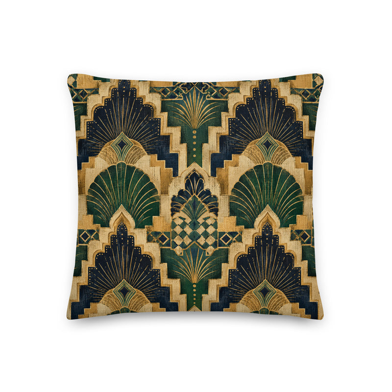 Decorative pillow with geometric pattern in green, gold, and black on a white background
