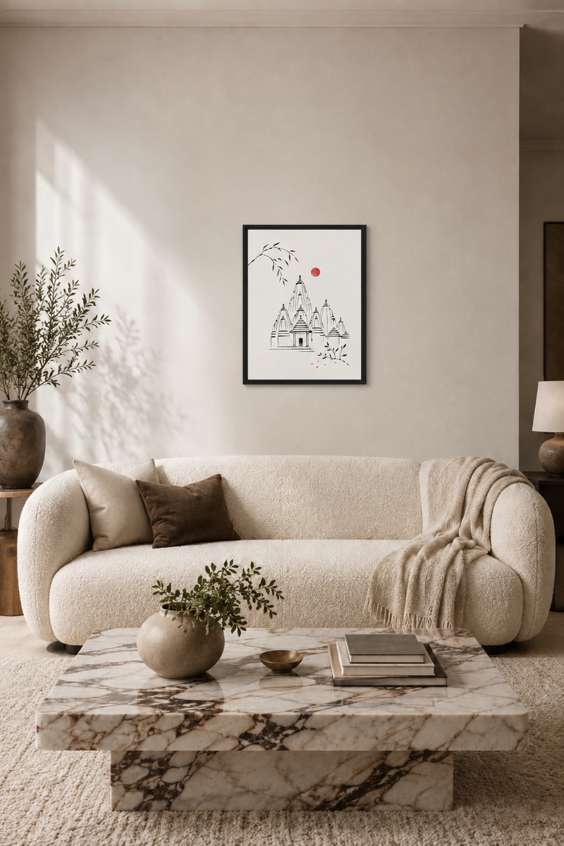 Living room with beige sofa, marble coffee table, and framed artwork on the wall.