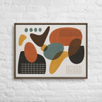 Abstract art print with geometric shapes in brown, green, and yellow on a white brick wall.