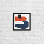 Abstract art piece with geometric shapes on a textured white wall