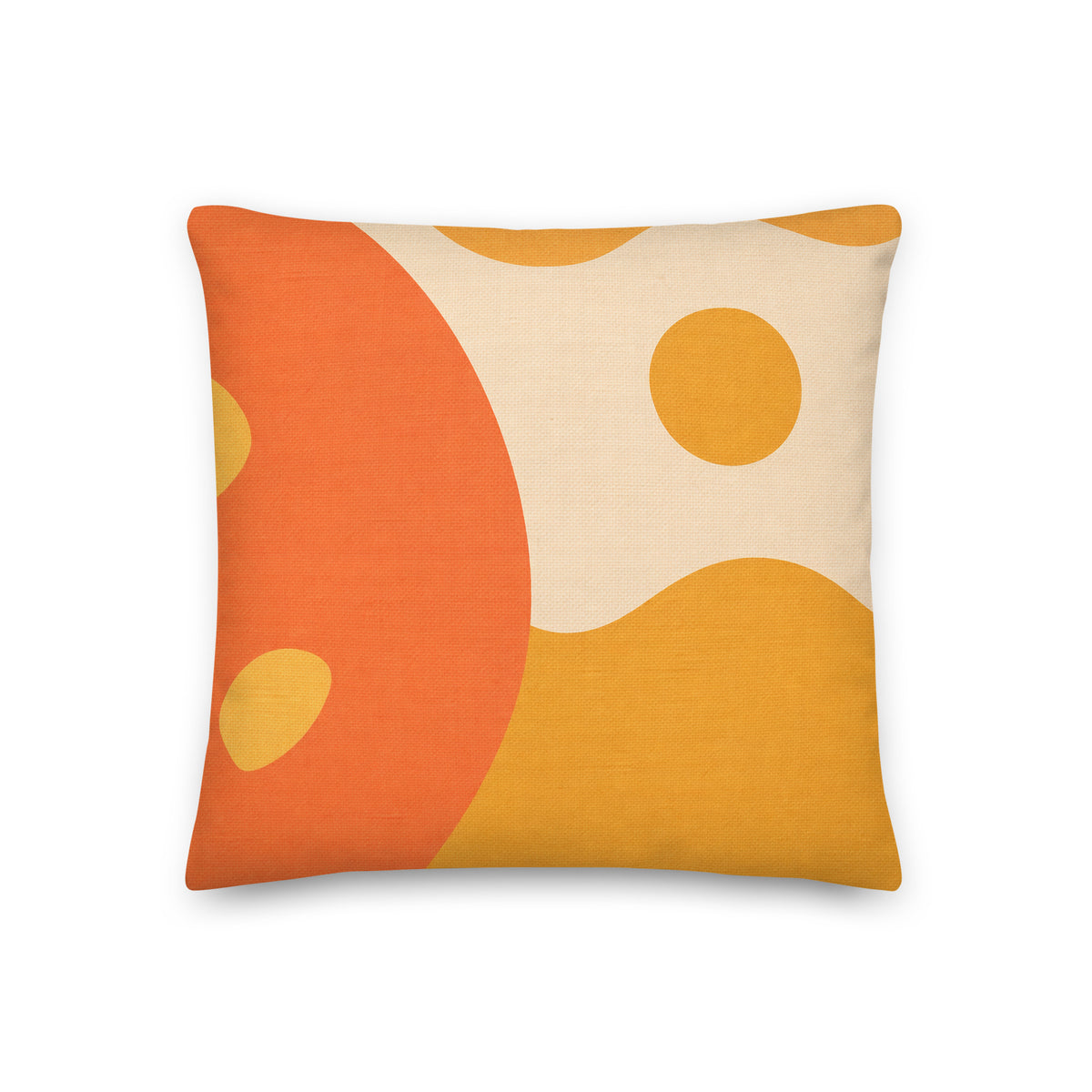Decorative pillow with orange and beige abstract design on a white background