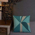 Decorative pillow with geometric pattern on a gray sofa