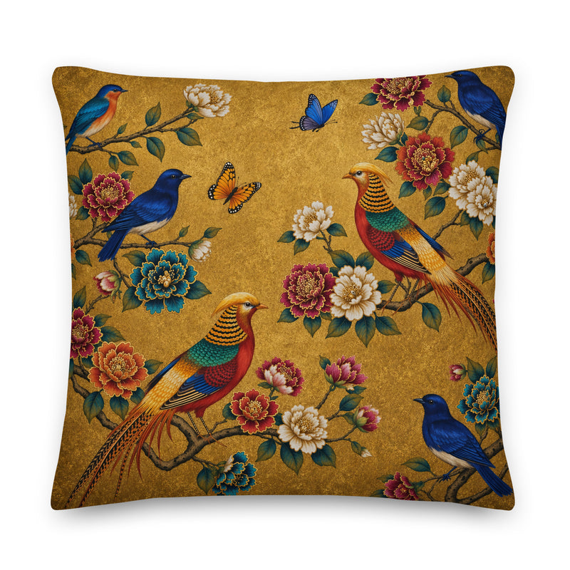 Decorative pillow with birds and flowers on a gold background