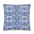 Decorative pillow with blue and white pattern on a white background