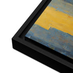 Abstract painting with yellow and blue colors in a black frame
