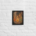 Framed artwork of dancers on a white brick wall
