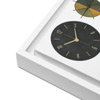 Clock with black face and gold hands in a white frame